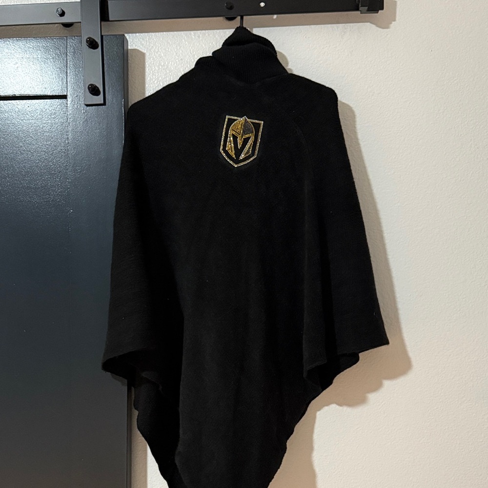 Black Poncho with Gold Emblem